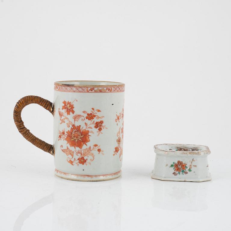 A rouge de fer mug and a famille rose salt, Qing dynasty, 18th Century.