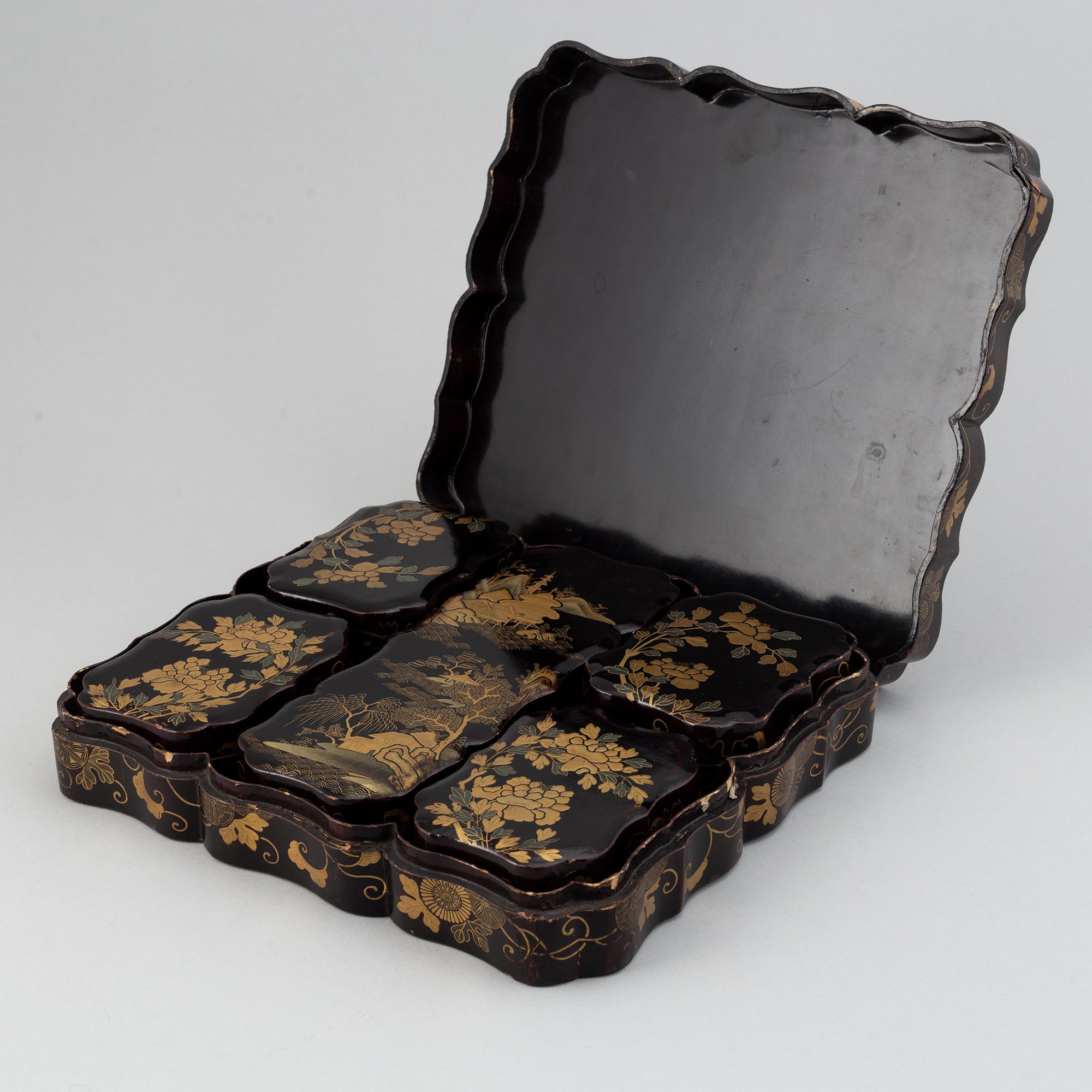 A box containing smaller boxes and mother of pearl chips for games, late Qing dynasty, 19th Century.