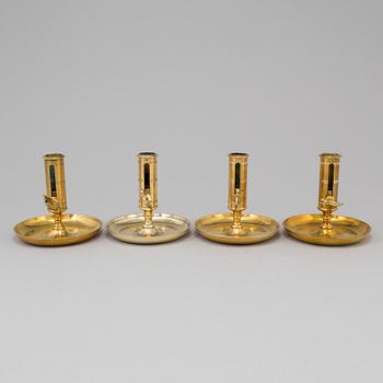 Four brass candlesticks from Skultuna and Svenska Metallverken, second half of the 20th Century.