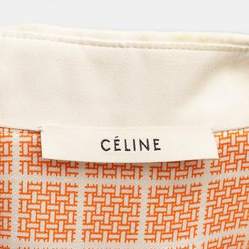 Céline, a silk and wool blouse, size 34.