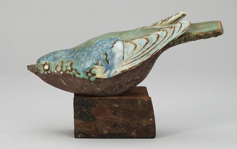 A Tyra Lundgren stoneware figure of a bird.