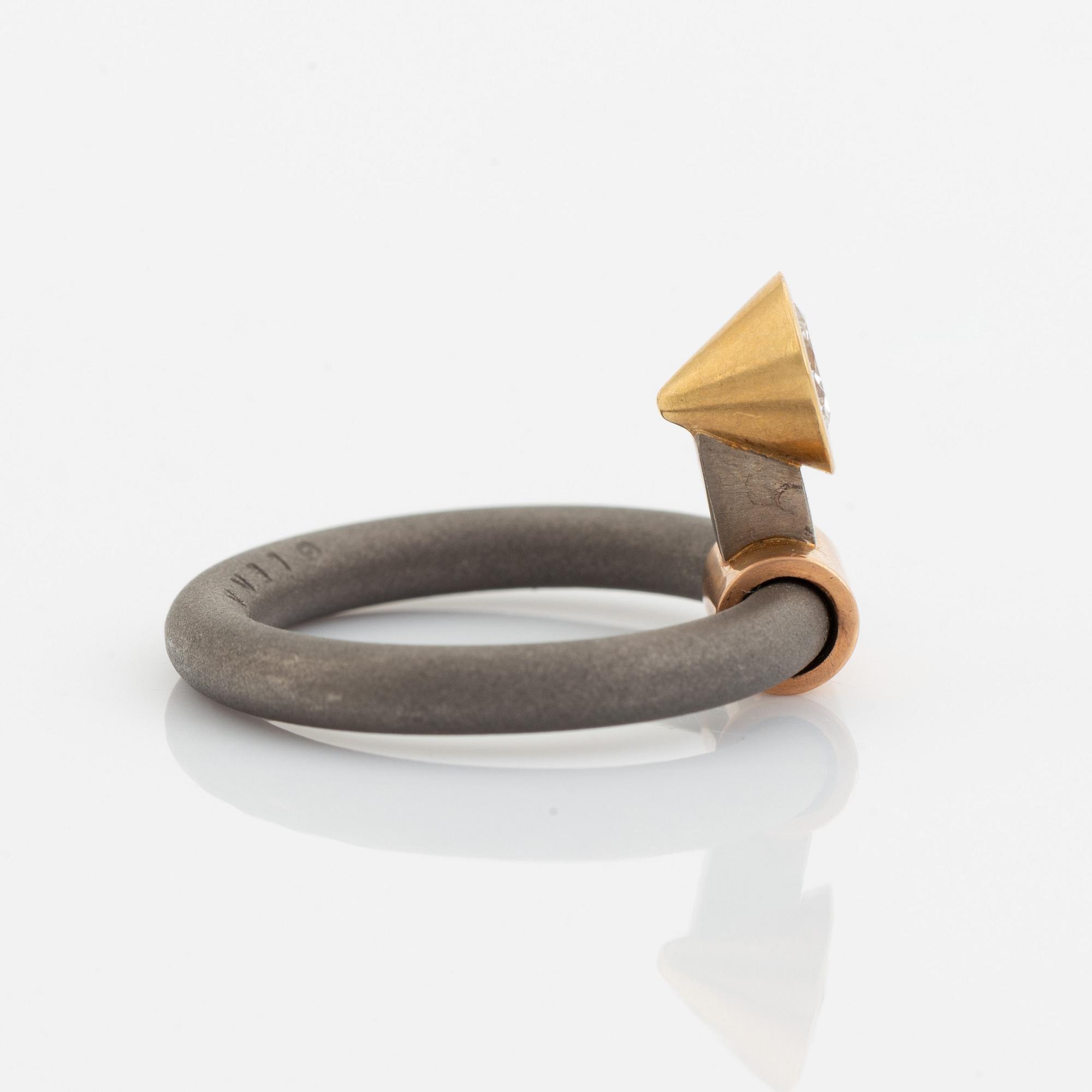 Glenn Roll, ring with brilliant cut diamond.