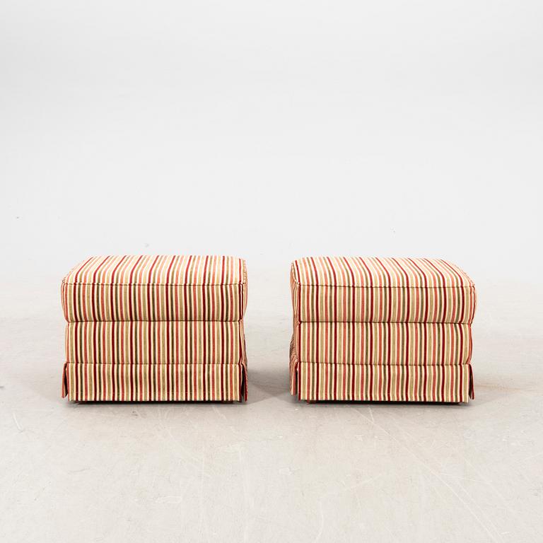 A pair of easy chairs with footstools by Bröderna Andersson 21st century.