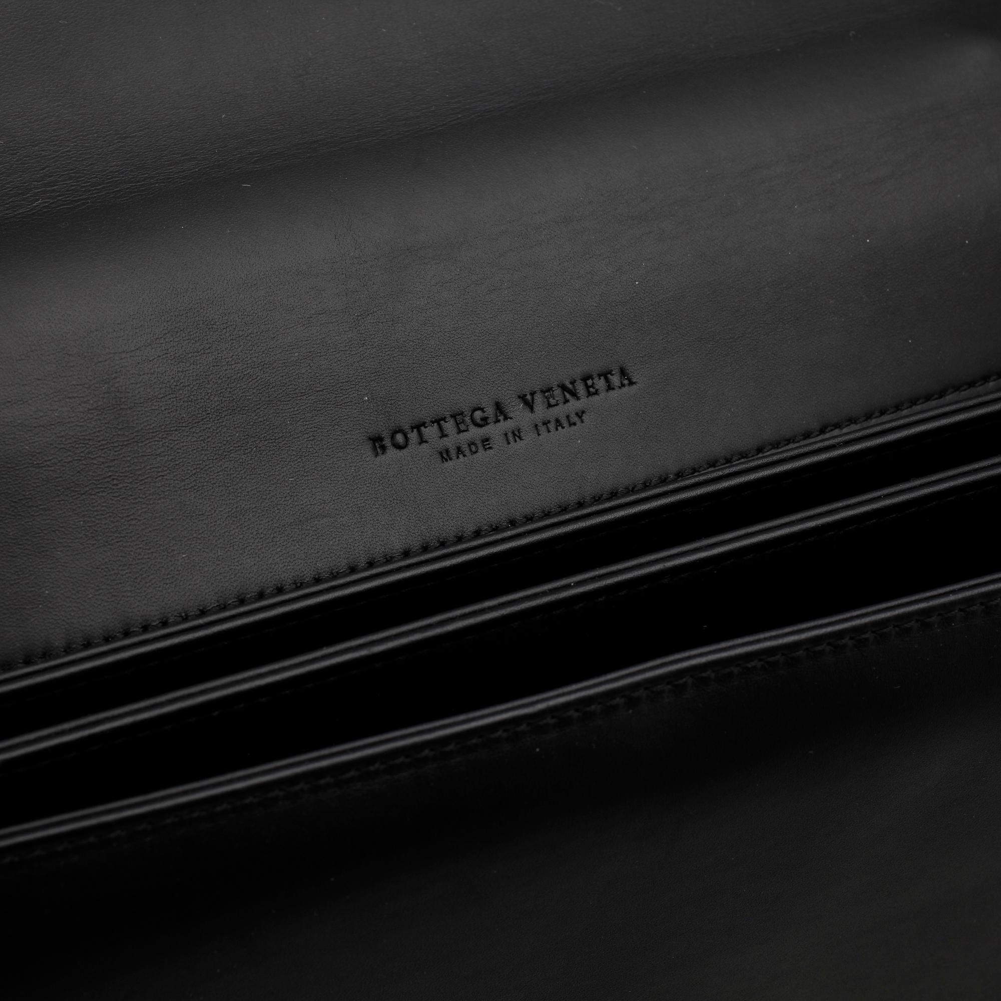 BOTTEGA VENETA, a black leather briefcase.