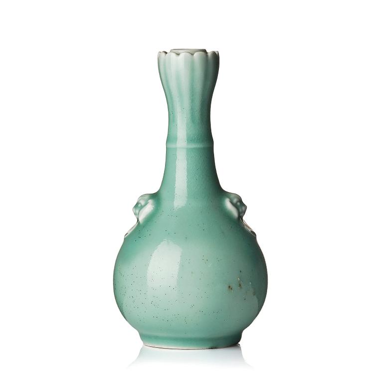 A celadon glazed vas, late Qing dynasty, with Yongzheng mark.