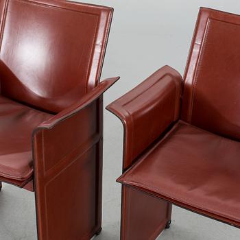 A PAIR OF "KORIUM" CHAIRS BY TITO AGNOLI, MATTEO GRASSI.