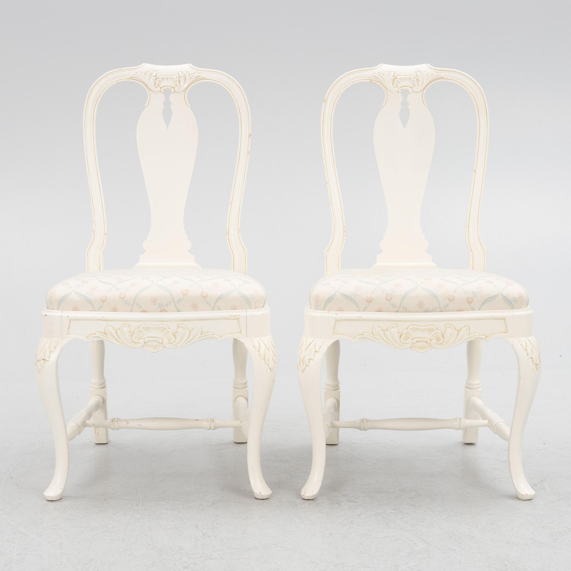 A Rococo style dining table with eight chairs, second half of the 20th century.