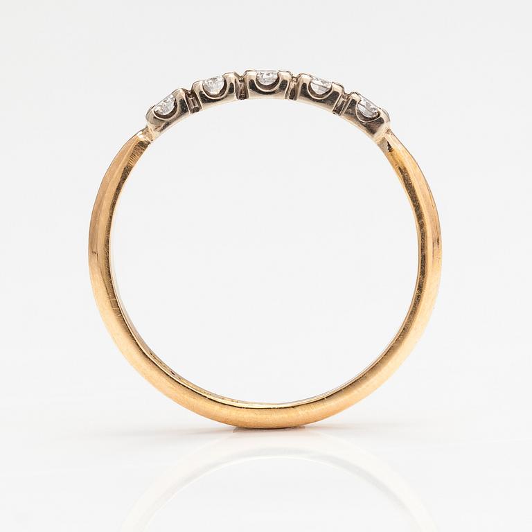 An 18K gold ring with diamonds ca. 0.20 ct in total. Lagercrantz Jewellery, Tammisaari 2013.