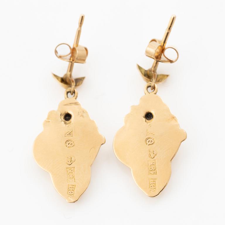 A pair of 18K gold earrings.