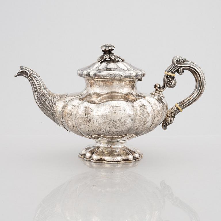 A Swedish Silver Rococo-Revival Teapot, mark of Gustaf Teodor Folcker, Stockholm 1852.