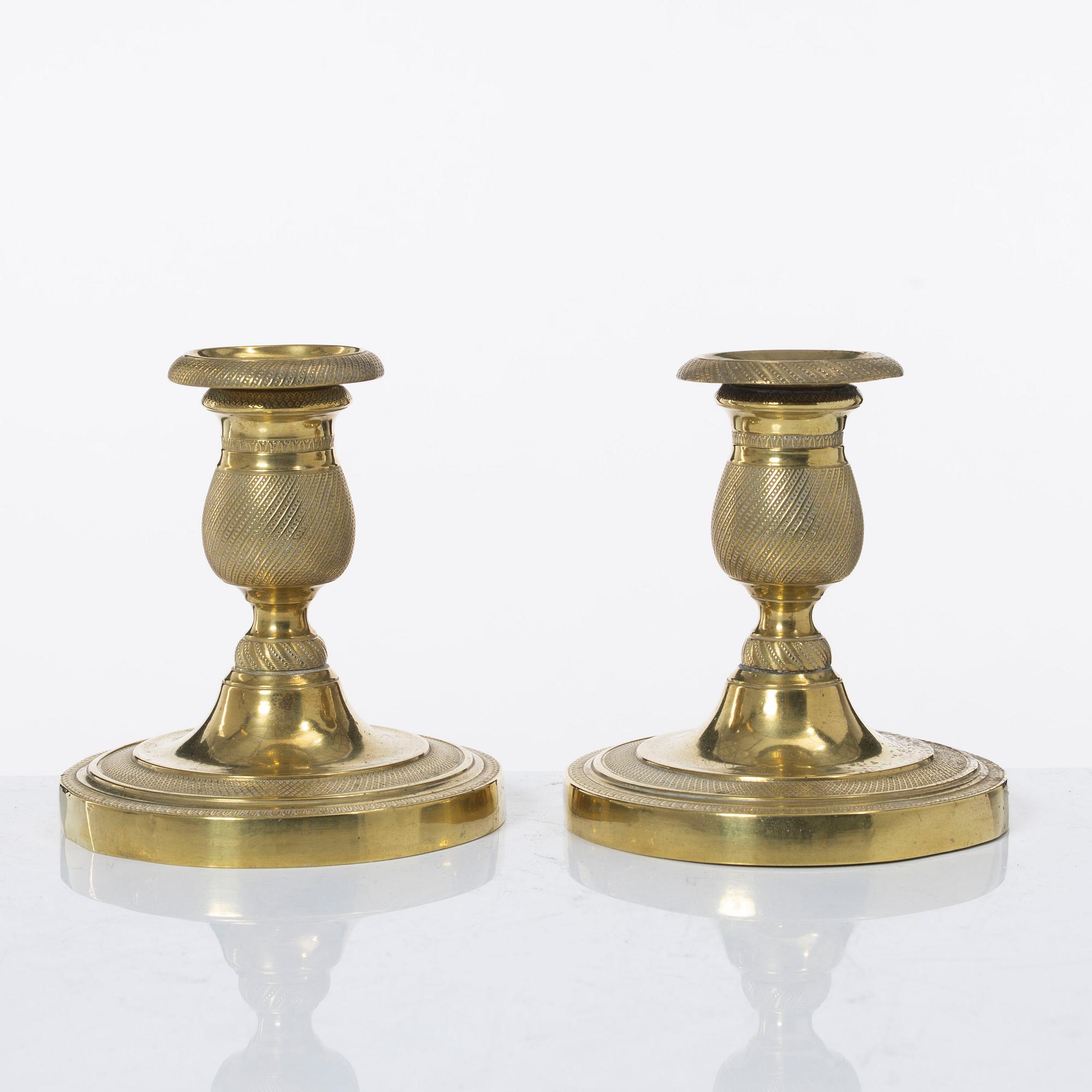 A pair of candle sticks, Empire, France, first half of the 19th century.