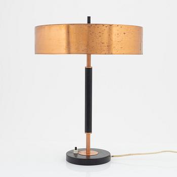 A copper table light, mid 20th Century.