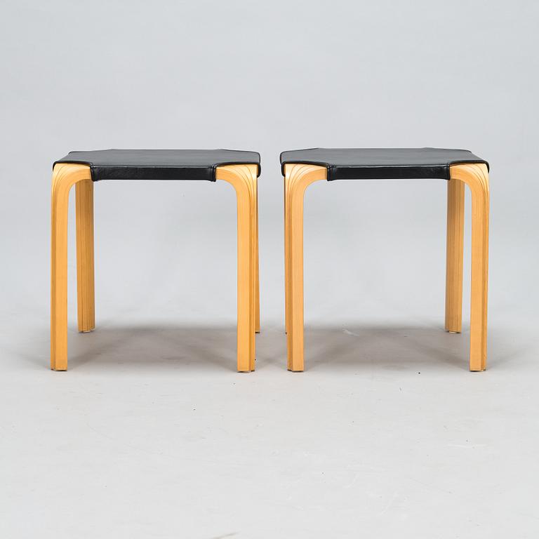 Alvar Aalto, a pair of 'X601' stool for Artek, later half of the 20th century.