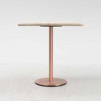 A steel and oak table by Jonas Lindvall 2011.