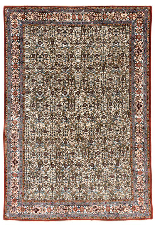 A carpet, semi-antique, Qum, ca 324 x 221 cm.