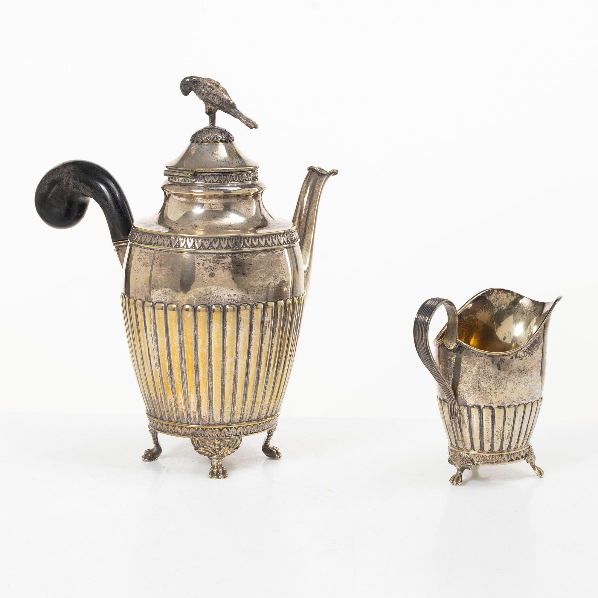 A Swedish silver coffee pot and cream jug, Gustavian style, early 20th century.