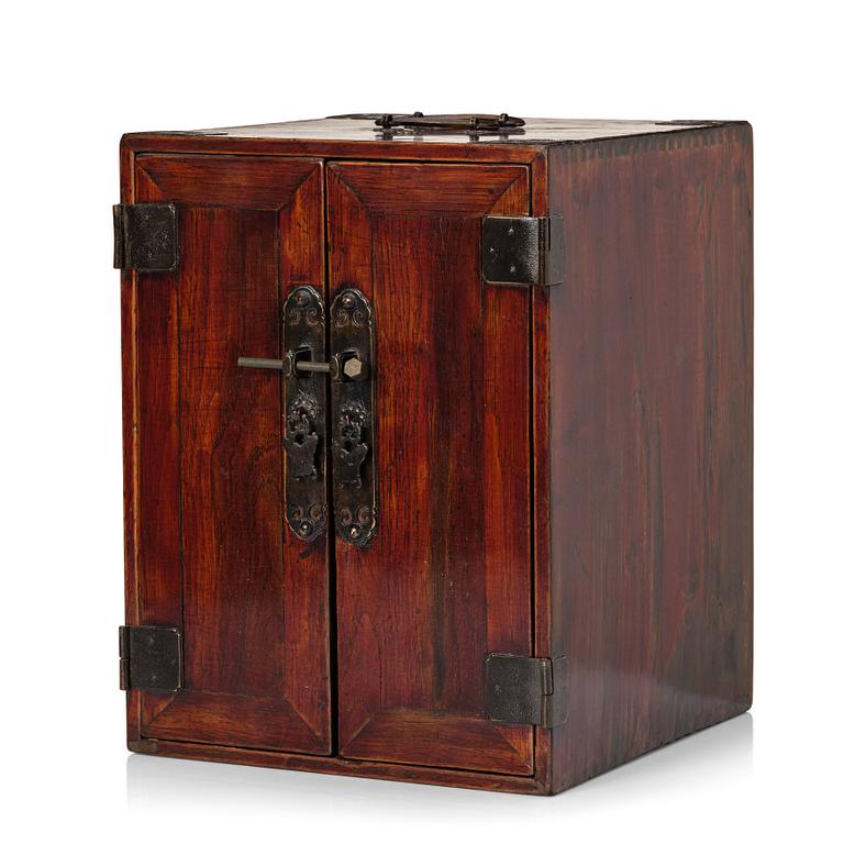 A Chinese hardwood cabinet/medicine chest, Qing dynasty/early 20th century.