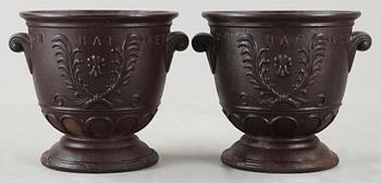 A pair of Ivar Johnsson cast iron jardinieres, Näfveqvarn, Sweden.