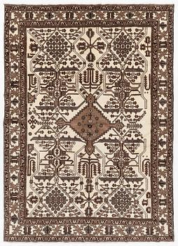 A Ferdos carpet, c. 295 x 210 cm.