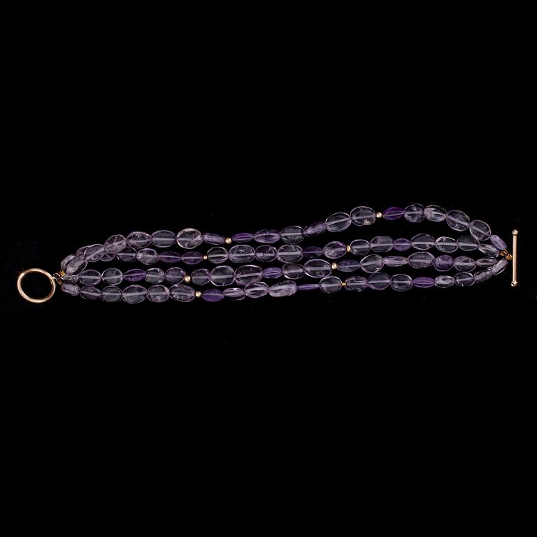 COLLIER, ARMBAND, RING samt BROSCH, ametister, 10/14K guld. 2000-tal.