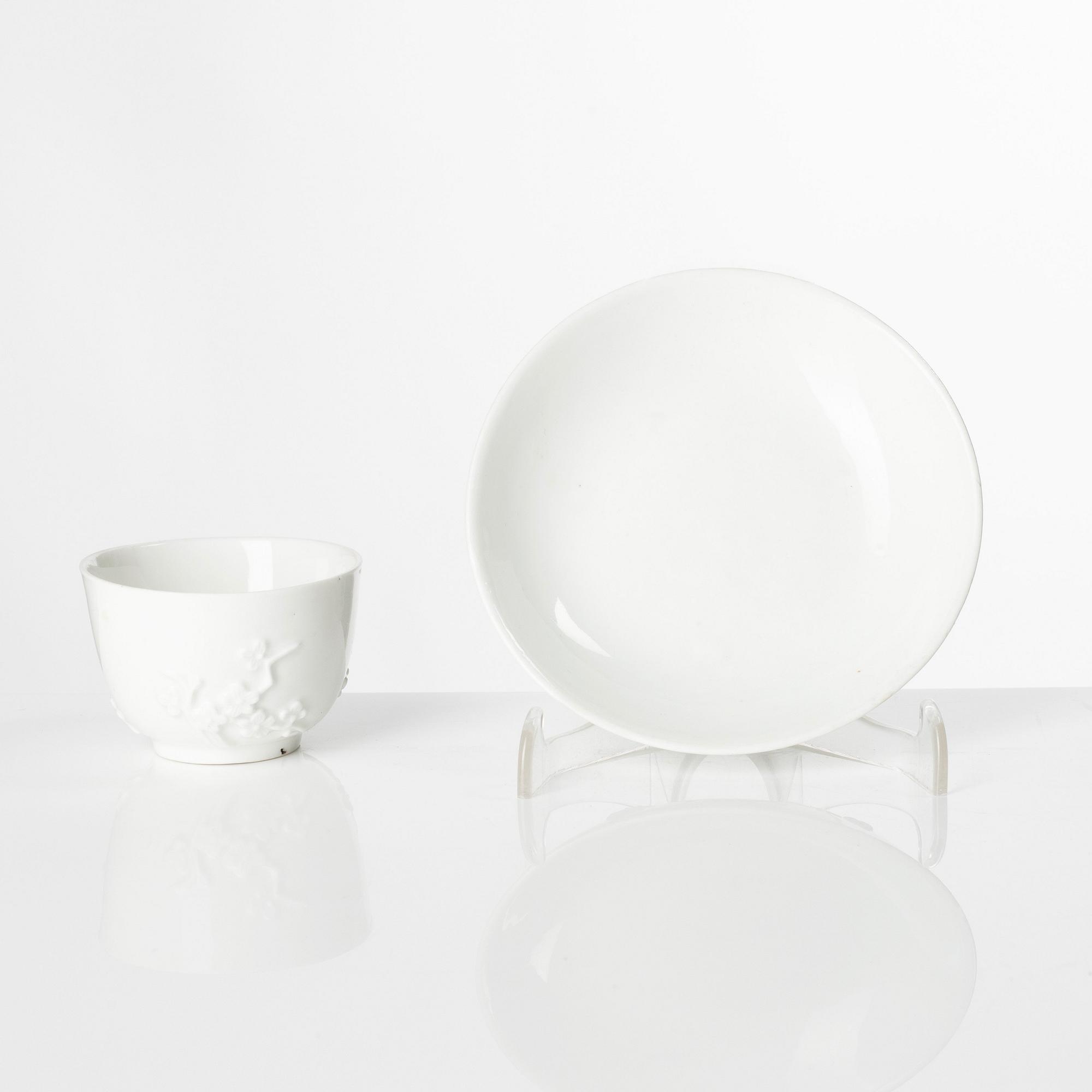 A blanc de Chine cup with saucer, Meissen, 18th century.