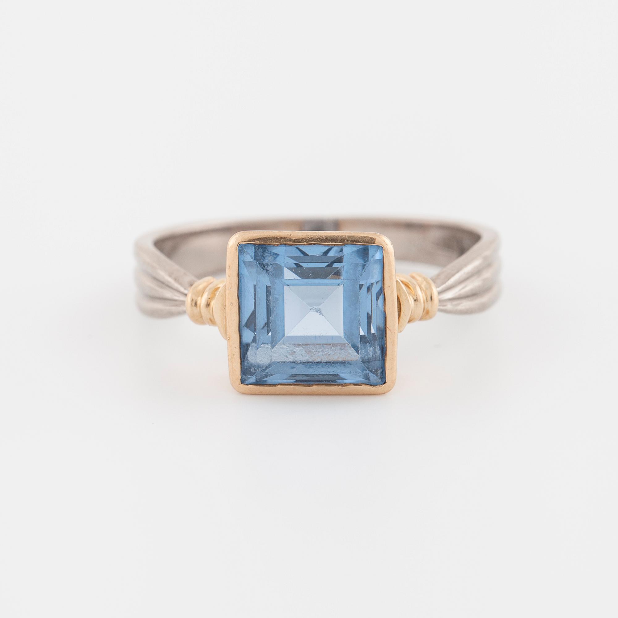 A synthetic blue spinel ring.