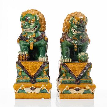 A pair of large figures of buddhist lions, China, second half of the 20th Century.