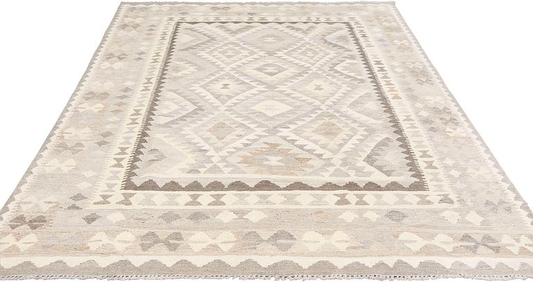 A kilim carpet, c 291 x 190 cm.