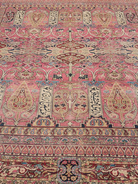 A CARPET, an antique Kerman Laver, ca 363 x 301 cm.