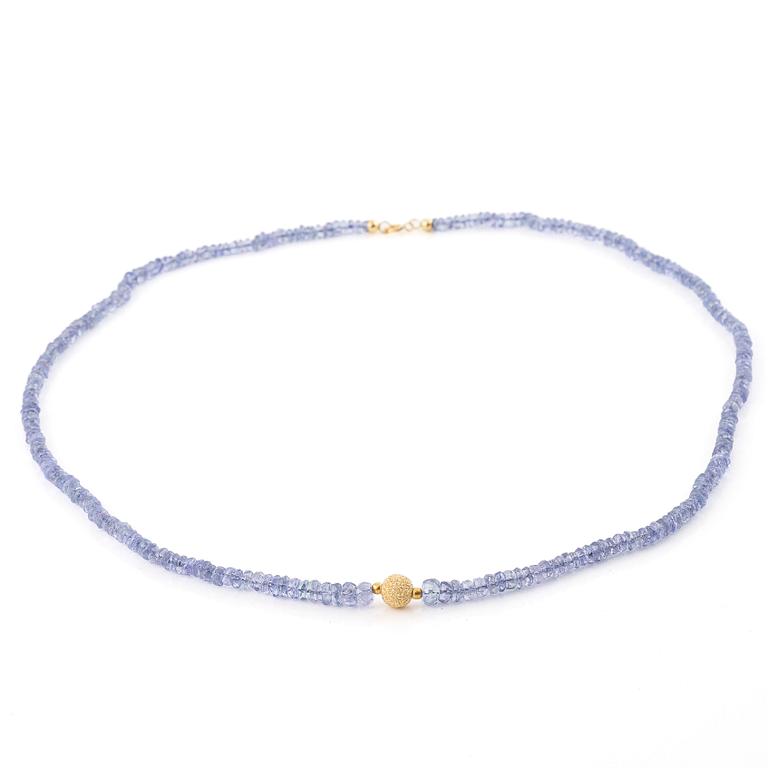 Collier och armband, med tanzaniter, lås 18K guld.