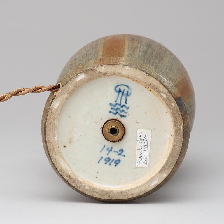 A Patrick Nordström stoneware table lamp with patinated brass mounts, Royal Copenhagen, Denmark 1919.