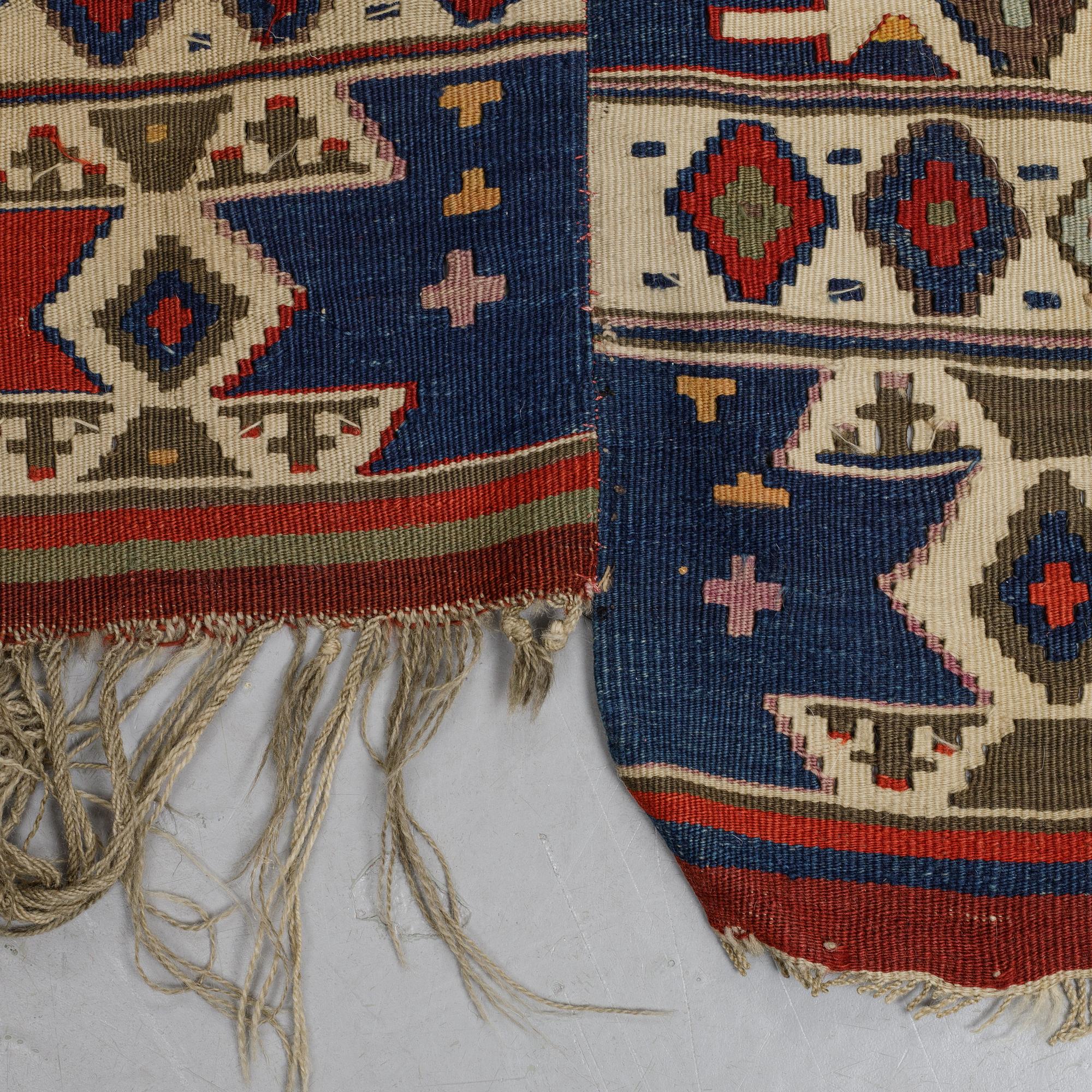 A carpet, a kilim, an antique Anatolian, ca 310-326 x 183,5-192 cm.