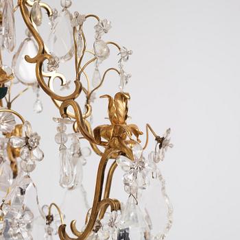 A French Louis XV-style six-branch gilt-bronze, rock crystal and amethyst chandelier, 19th century.