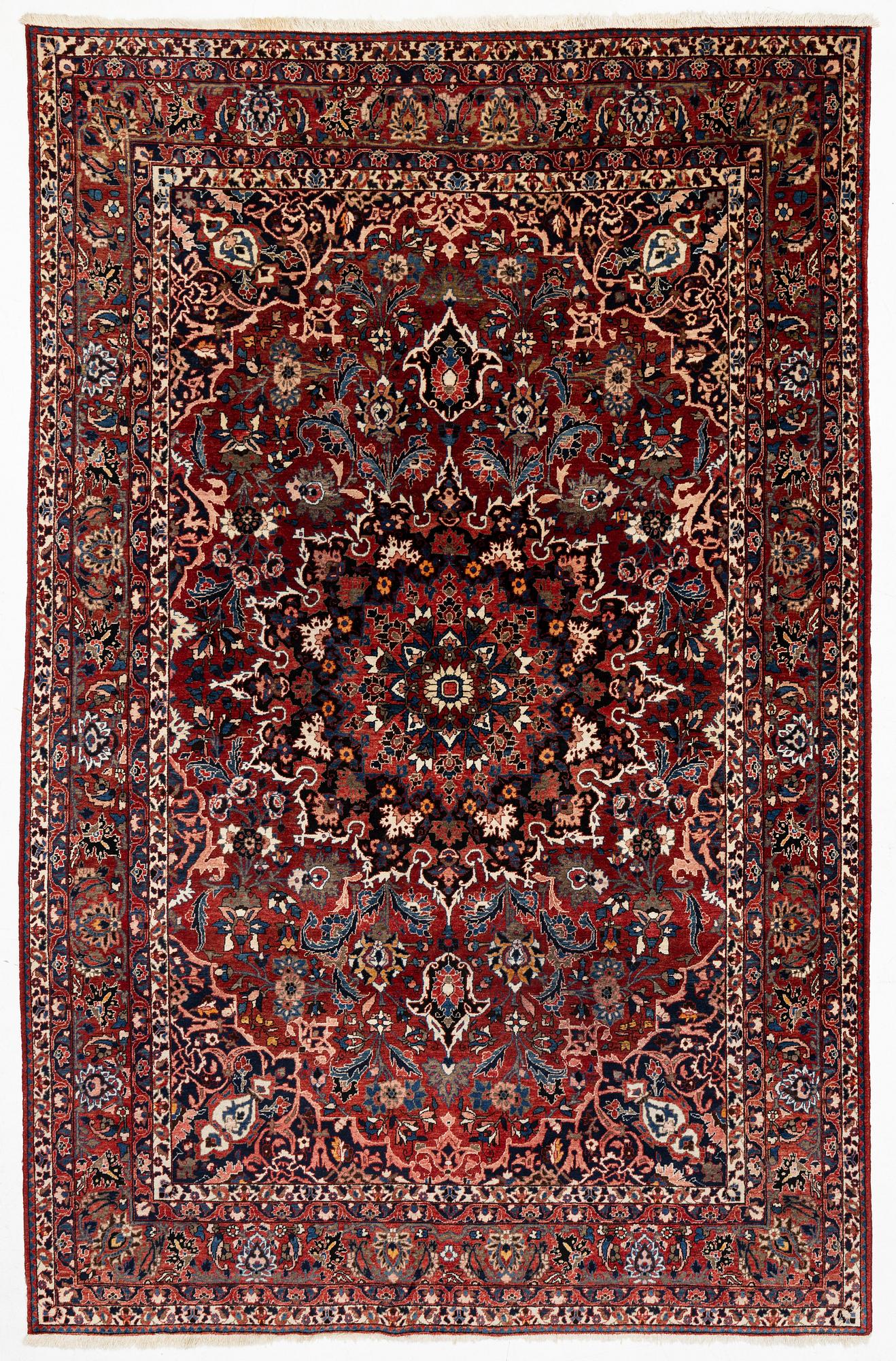 A Persian carpet. ca 400 x 260 cm.