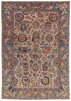 A semi-antique Tabriz ‘Zir Khaki' carpet, ca 366 x 251 cm.