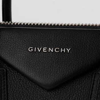 Givenchy, a black leather 'Antigona' bag.