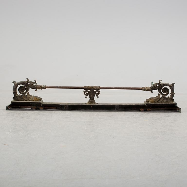 A 19th century bronze fire stand.