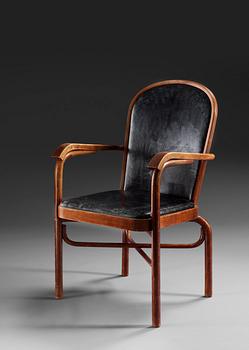 A Sigurd Lewerentz stained beech and black leather chair.