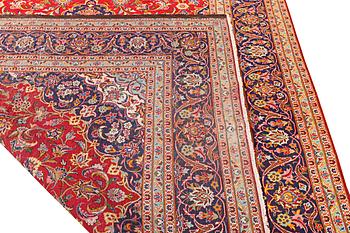 A Kashan carpet, a. 360 x 243 cm.