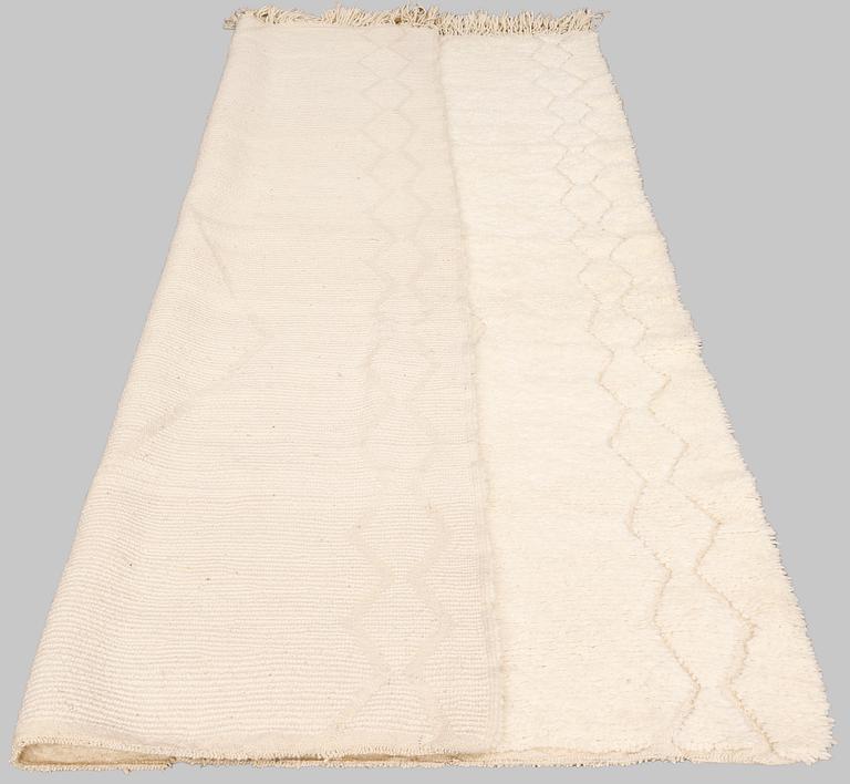 A moroccan carpet, ca 250 x 168 cm.