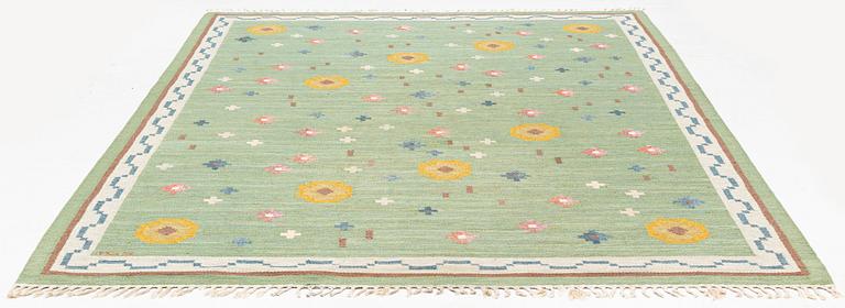 Anna-Greta Sjöqvist, a carpet, 'Blomsteräng', flat weave, approximately 351 x 241 cm, signed AGS.