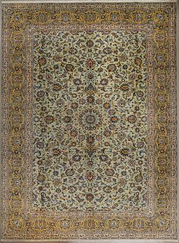 A Keshan rug, signed, 400 x 300 cm.