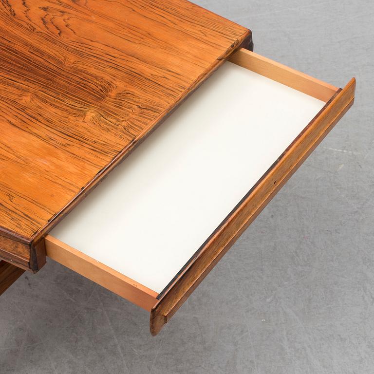 A second half of the 20th century rosewood coffee table.