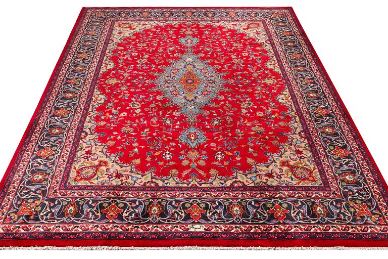 A Keshan carpet, c. 360 x 250 cm.