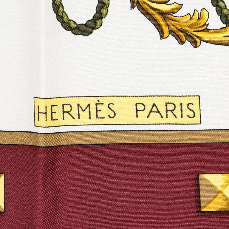 Hermès, a 'Le Cléfs' silk scarf.