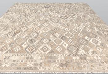 A Kilim carpet, ca 391 x 311 cm.