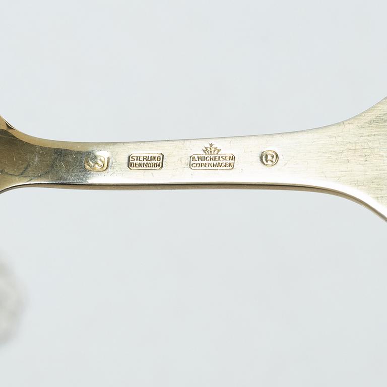 Anton Michelsen, Annual/Christmas flatware, 6 pieces, gilt sterling silver and enamel, Denmark, 1950s.