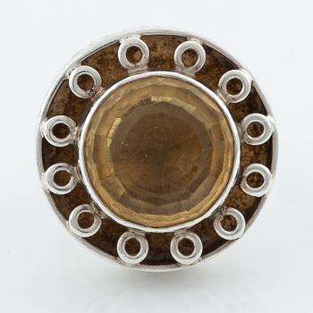 Silver ring with gold stone, signed Ulla Holm.