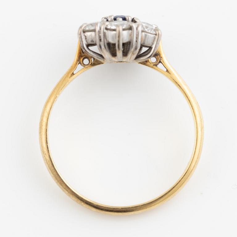 Ring, 18K gold with sapphire and brilliant-cut diamonds.