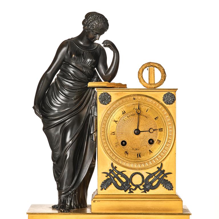 A French Empire early 19th century mantel clock, by Antoine André Ravrio.